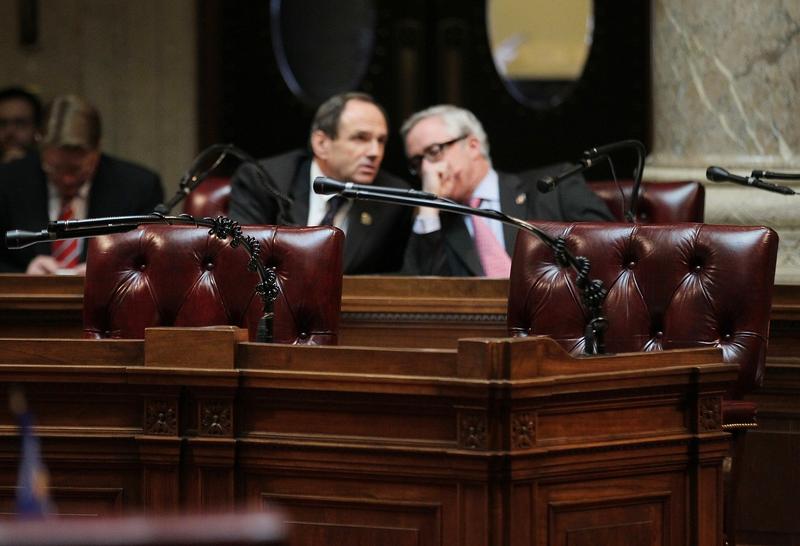 The chairs of Wisconsin seante democrats sit empty during a session of the State Senate at the Wisconsin State Capitol on March 8, 2011 in Madison, Wisconsin.