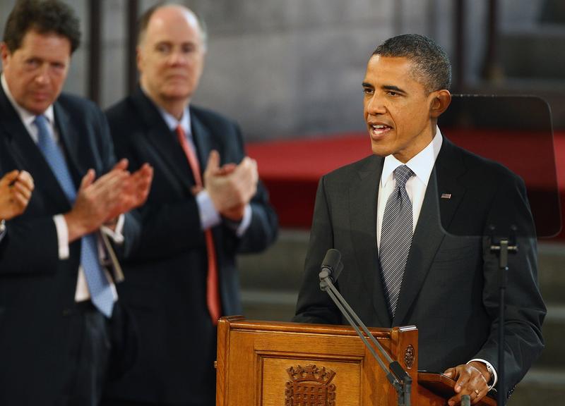 US President Barack Obama is applauded as he delivers a speech at the British parliament in London, on May 25, 2011.