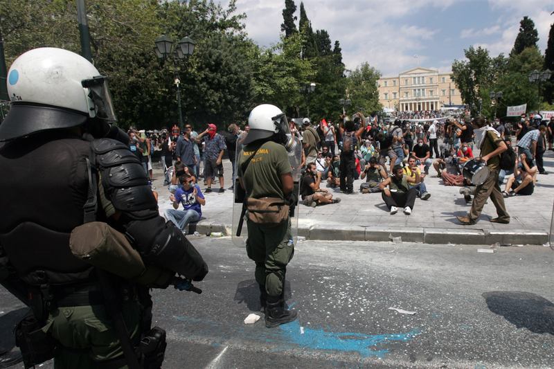 Demonstrators clash with police during a protest against plans for new austerity measures on June 28, 2011 in Athens, Greece.