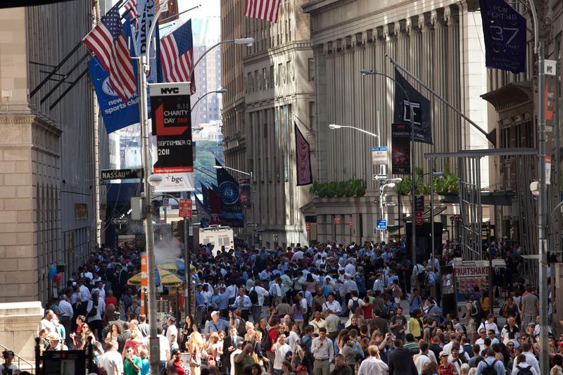 Crowds stand on Wall Street after a 5.9 earthquake struck on August 23, 2011 in New York, United States. The epicenter of the 5.9 earthquake was located near Louisa in central Virginia.