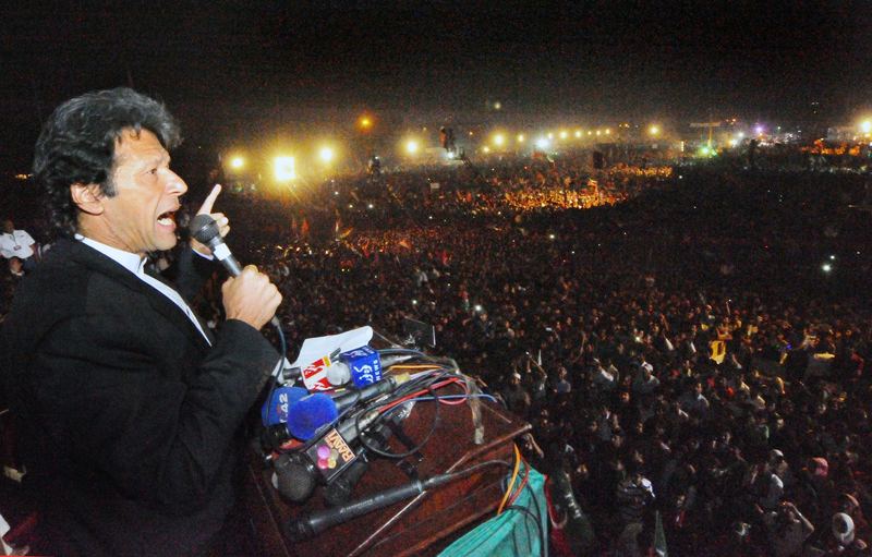 Pakistani politician and former cricketer Imran Khan addresses a rally in Lahore on October 30, 2011.