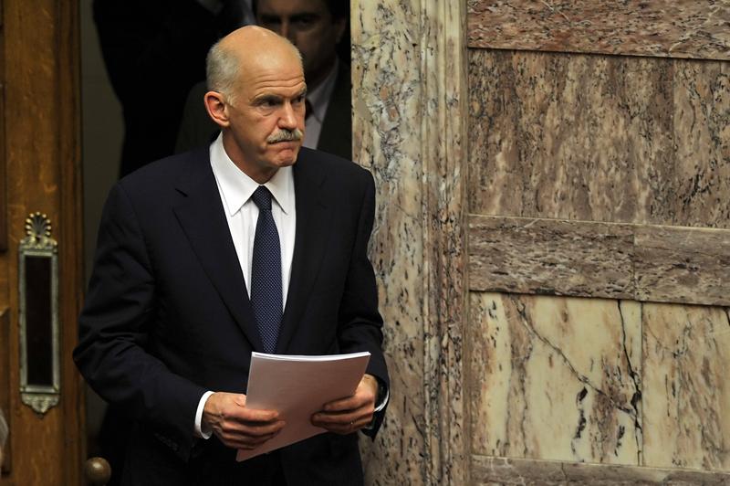 Greek Prime Minister George Papandreou arrives a parliament session on the confidence vote.