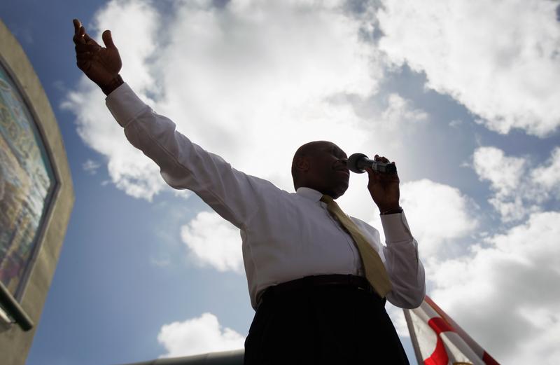Republican Presidential candidate Herman Cain speaks during a campaign visit.