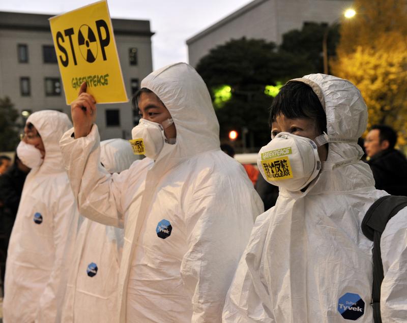 Greenpeace activists protest against nuclear plants in front of the prime minister's office in Tokyo.