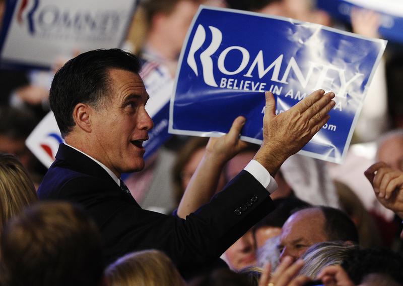 Mitt Romney greets supporters after addressing a primary night victory rally in Manchester, New Hampshire.