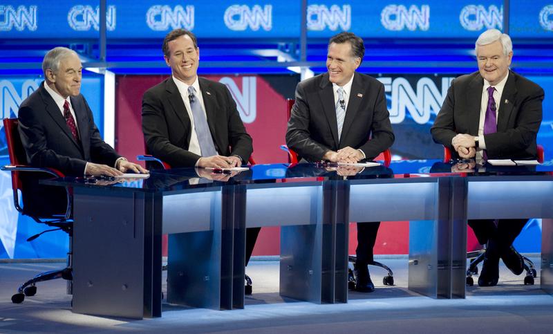 Republican presidential candidates Ron Paul (L), Rick Santorum (2nd L), Mitt Romney (2nd R) and Newt Gingrich during their debate on February 22, 2012 in Mesa, Arizona.