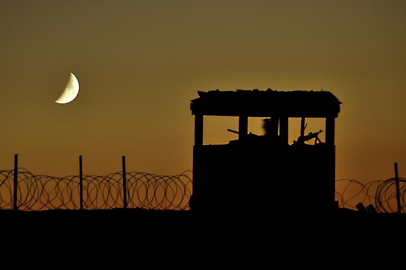 An Army soldier staffs a security outpost at a construction site approximately 25 miles north of Kandahar, in Afghanistan