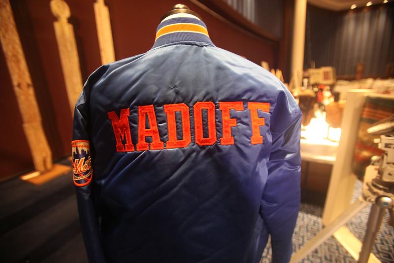A Bernard Madoff New York Mets baseball jacket is displayed during a press preview of a U.S. Marhals Service auction of personal property seized from Bernard and Ruth Madoff.