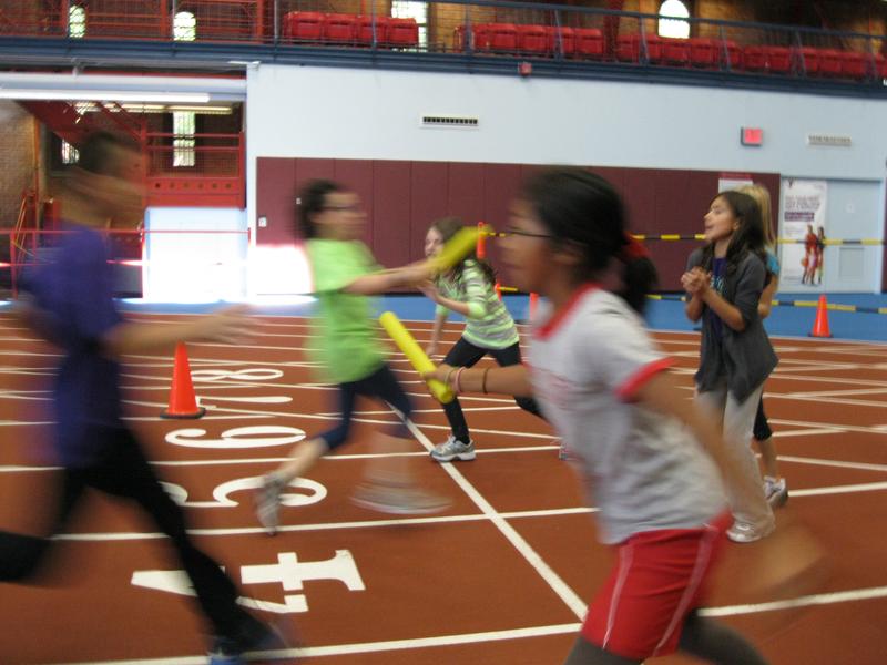 Relay racing is one of three activities 5th graders at PS107 participate in during gym class