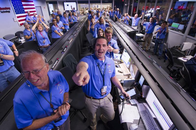 NASA/JPL ground controllers react to learning the the Curiosity rover had landed safely on Mars.
