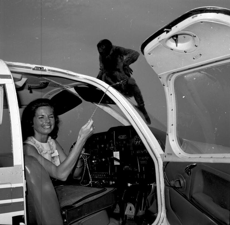 June Douglas with her flight mascot, Barefoot, prior to setting out on a 1,468 mile race. May 26, 1965.