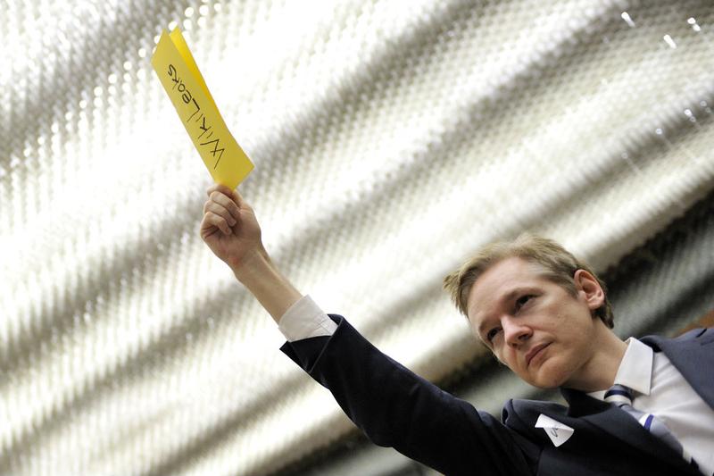 Wikileaks founder Julian Assange requests the floor during a meeting with U.S. State Department officials on the sideline of a United Nations meeting in Geneva on Nov. 5, 2010
