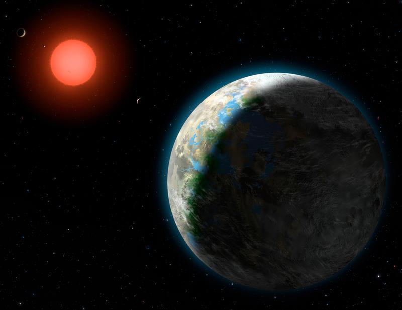 This artist's conception shows the inner four planets of the Gliese 581 system and their host star, a red dwarf star only 20 light years away from Earth.