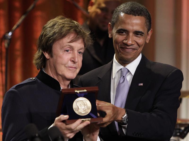 President Barack Obama presents Paul McCartney with the third Gershwin Prize for Popular Song at the White House in Washington, DC on June 2, 2010.