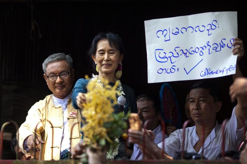 Aung San Suu Kyi addresses thousands of her supporters at her National League for Democracy headquarters on November 14, 2010 in Yangon, Burma