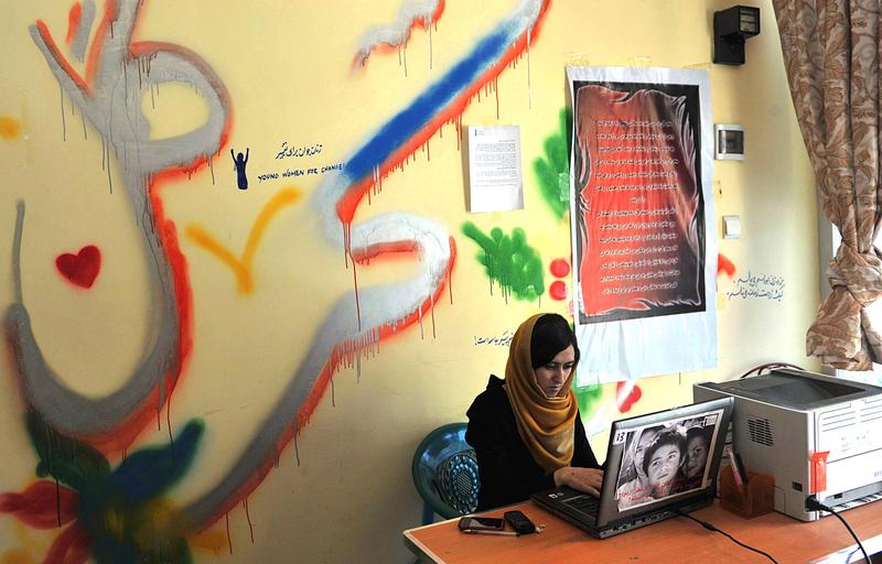 Tooba Ahmadyar ,17, uses her computer at the Young Women For Change internet cafe, Afghanistan's first women-only net cafe, in Kabul. July 22, 2012