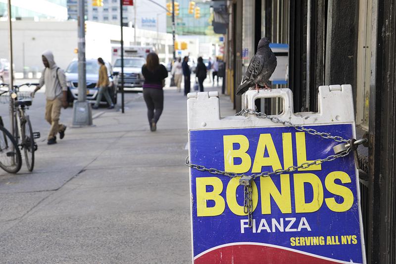 Offices advertising bail bonds across the street from the Bronx Family Court.