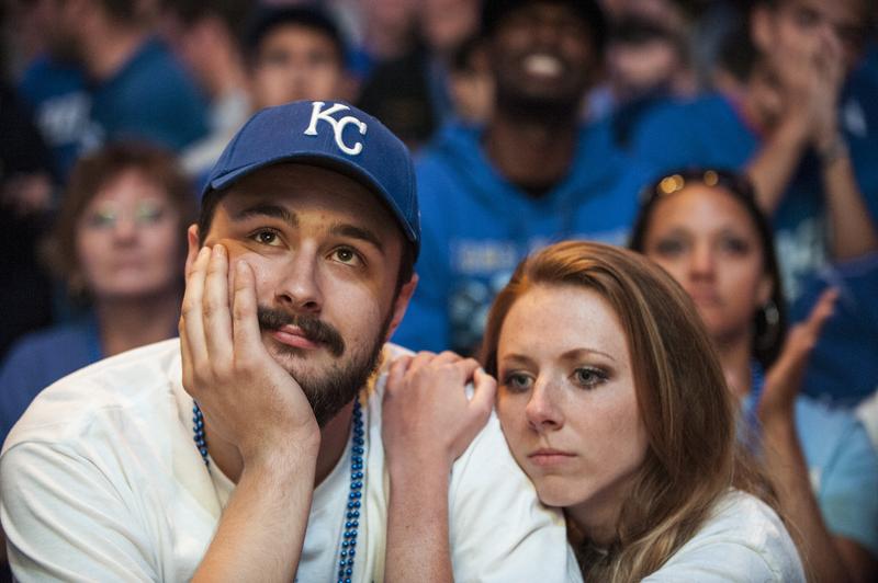 Kansas City Royals fans react to their team's defeat in the Power and Light District during Game Seven of the World Series on October 29, 2014 in Kansas City, Missouri.
