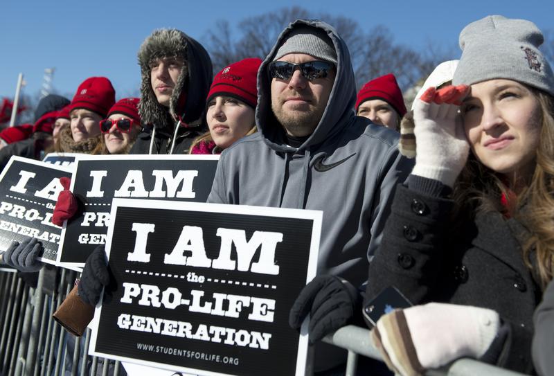 Thousands of anti-abortion demonstrators attend a rally on the National Mall during the 41st annual March of Life in Washington, DC, January 22, 2014.