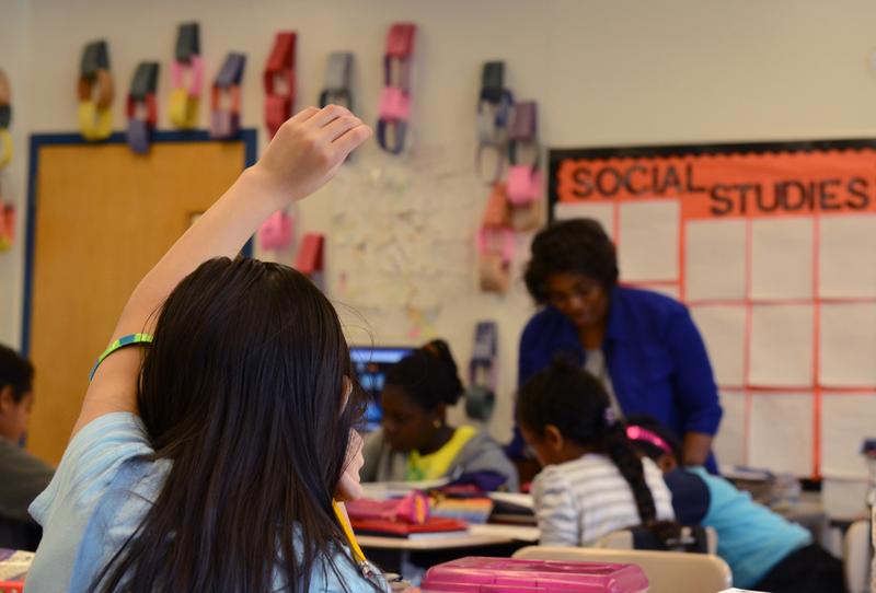 A student at Piney Branch Elementary School asks for help as her class goes over fractions. Montgomery County teachers are training themselves to instruct students under the Common Core guidelines.