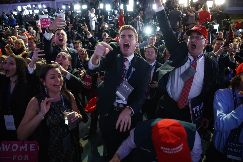 Supporters of President-elect Donald Trump cheer as they watch election returns during an election night rally, Nov. 8, 2016, New York