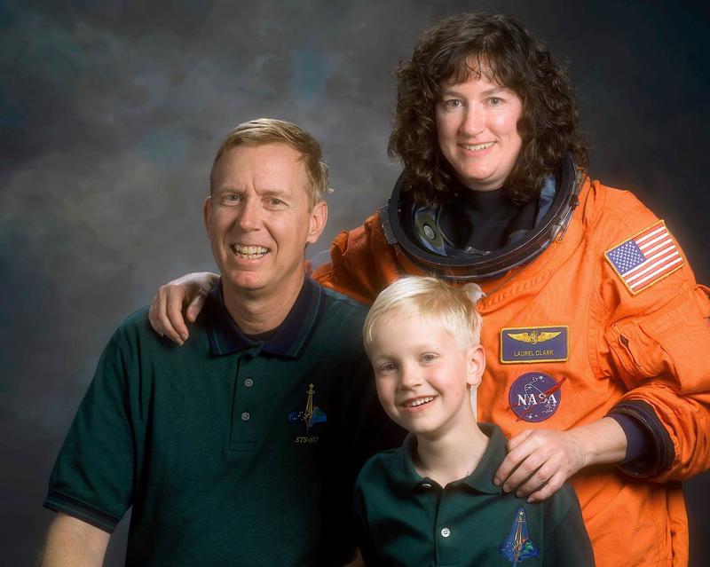 Jonathan Clark, with his wife, Laurel, and their son, Iain