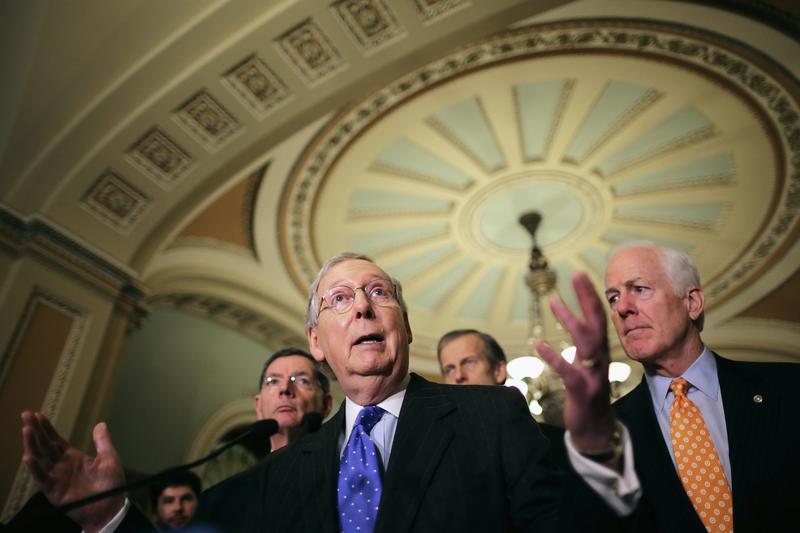 Senate Majority Leader Mitch McConnell (R-KY) talks to reporters with Senate Majority Whip John Cornyn (R-TX) (R) following the weekly Senate GOP policy luncheon at the U.S. Capitol. December 15, 2015
