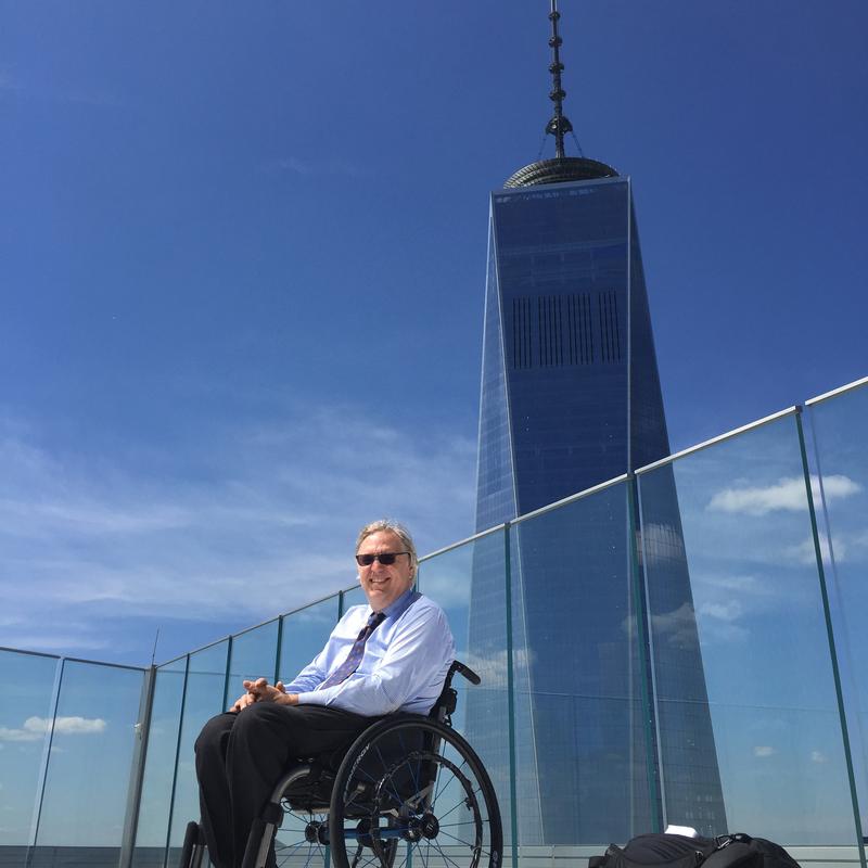 Takeaway Host John Hockenberry pictured next to the Freedom Tower.