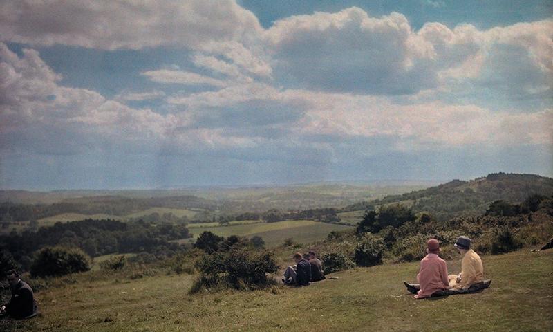 <em>Locals enjoy the view of the Surrey Hills in England, 1928.</em>