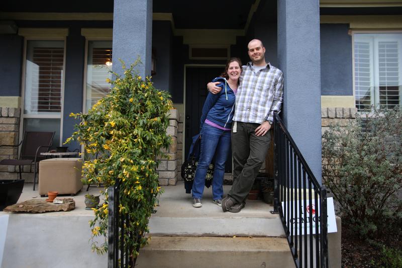 Kathy Sokolic and her husband, Mike Sears, outside their home in the Muëller community