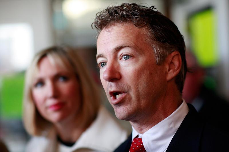 Rand Paul, Kentucky's Senator-elect, and his wife, Kelley, talk with reporters after casting their ballots November 2, 2010 in Bowling Green, Kentucky.