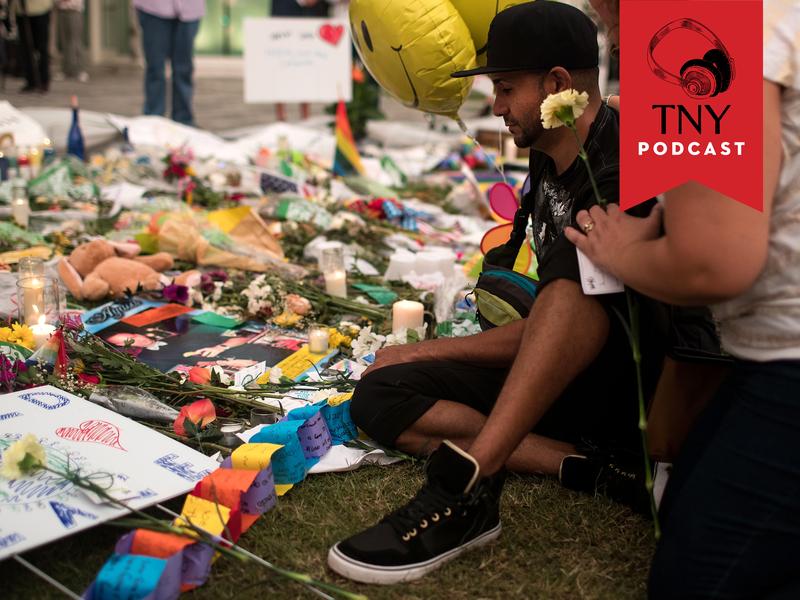 ORLANDO, FL - JUNE 14: People visit a memorial for the victims of the Pulse Nightclub shooting, at the Dr. Phillips Center for Performing Arts, June 14, 2016 in Orlando, Florida. The shooting at Pulse