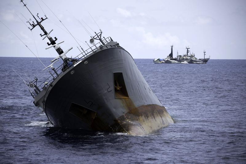 THE THUNDER SINKING. April 2015. The Sea Shepherd ships remain at a safe distance from the sinking poaching vessel.