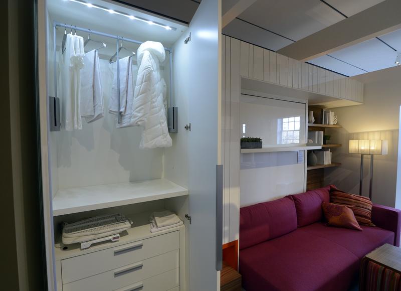 From a Queens Townhouse to a 350-Square-Foot Apartment in ... The closet inside a 325-square-foot studio apartment during an exhibit  displaying a