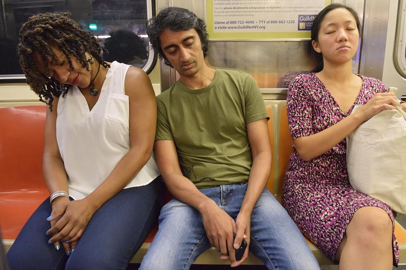People Sleeping on Subway