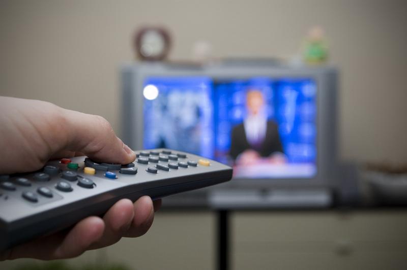 Watching television.