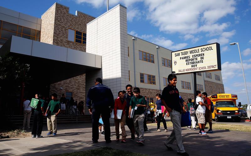 Students are dismissed from Sam Tasby Middle School on October 1, 2014 in Dallas, Texas. Officials confirmed that a student, who had contact with the first confirmed Ebola virus patient in the United