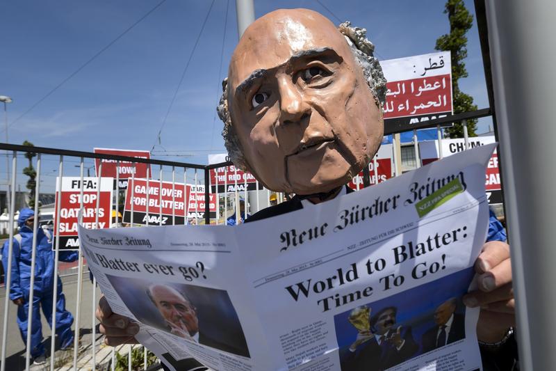 A demonstrator disguised as FIFA President Sepp Blatter takes part in a protest against the condition of workers in Qatar, on the sidelines of the 65th FIFA Congress on May 28, 2015 in Zurich.