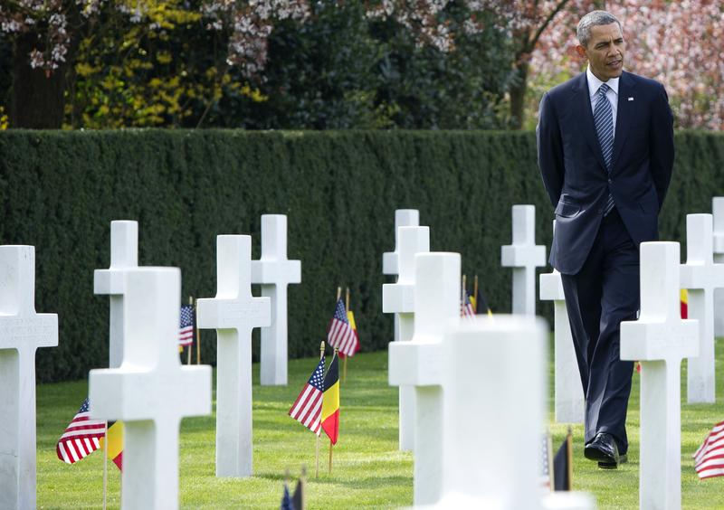 President Barack Obama visits the WWI Flanders Field Cemetery in Waregem on March 26, 2014. The cemetery is the final resting place for 368 Americans, most of whom were killed during World War I.