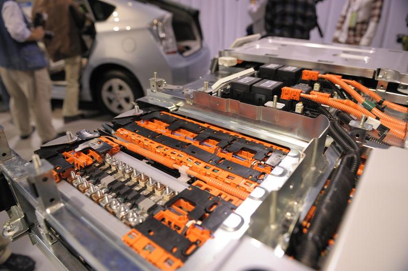 A sample showing the insides of a new lithium-ion battery is on display during Toyota Motors' new Prius Plug-in Hybrid vehicle press preview at the company's showcase, Mega Webb in Tokyo.