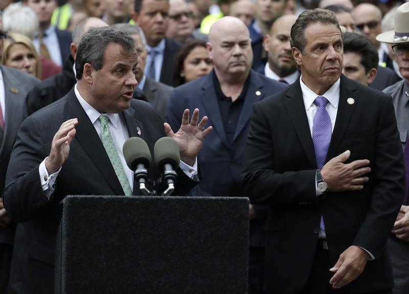 NJ Gov. Chris Christie, left, speaks during a news conference on the train crash at the Hoboken Terminal as NY Gov. Andrew Cuomo, right, listens, Thursday, Sept. 29, 2016, in Hoboken, N.J.