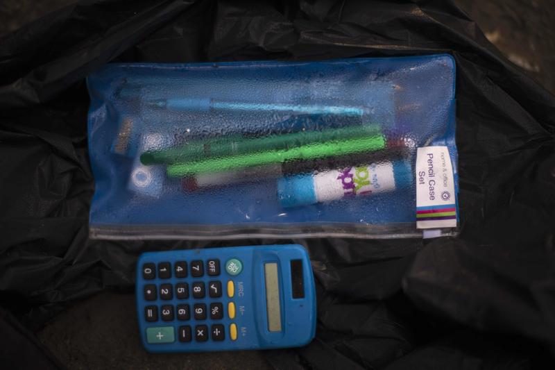 A calculator left behind by migrants in an abandoned tent in Northern France.