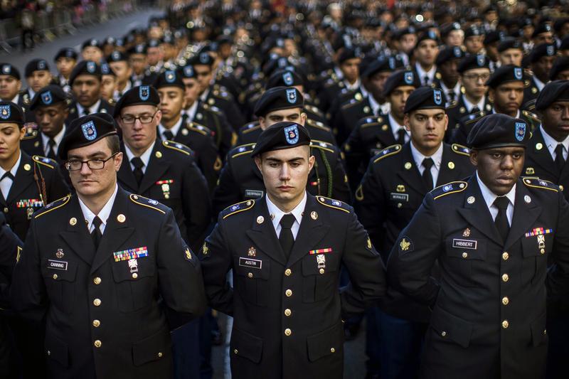 Military personnel march in the annual Veteran's Day parade in New York, Friday, Nov. 11, 2016.