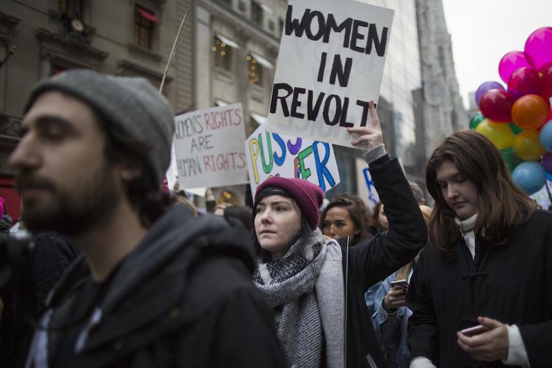 Demonstrators march up 5th Avenue during a women's march, Saturday, Jan. 21, 2017, in New York.
