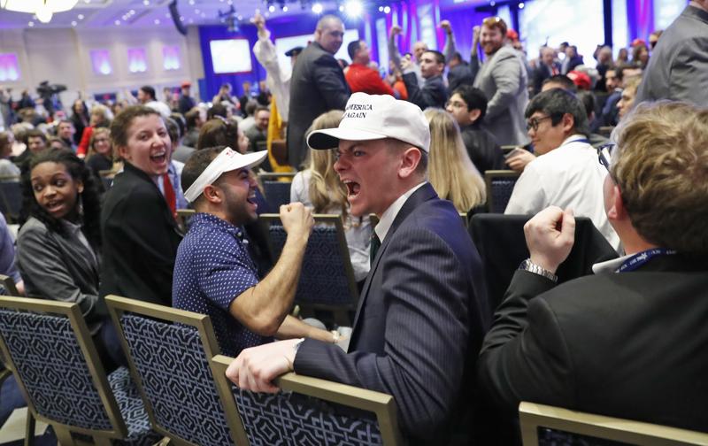 Supporters shout down a protester as President Donald Trump speaks at the Conservative Political Action Conference (CPAC), Feb. 24, 2017.