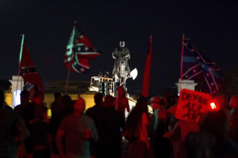 A statue of Confederate Gen. P.G.T. Beauregard is prepared for removal from the entrance to City Park in New Orleans, Tuesday, May 16, 2017.