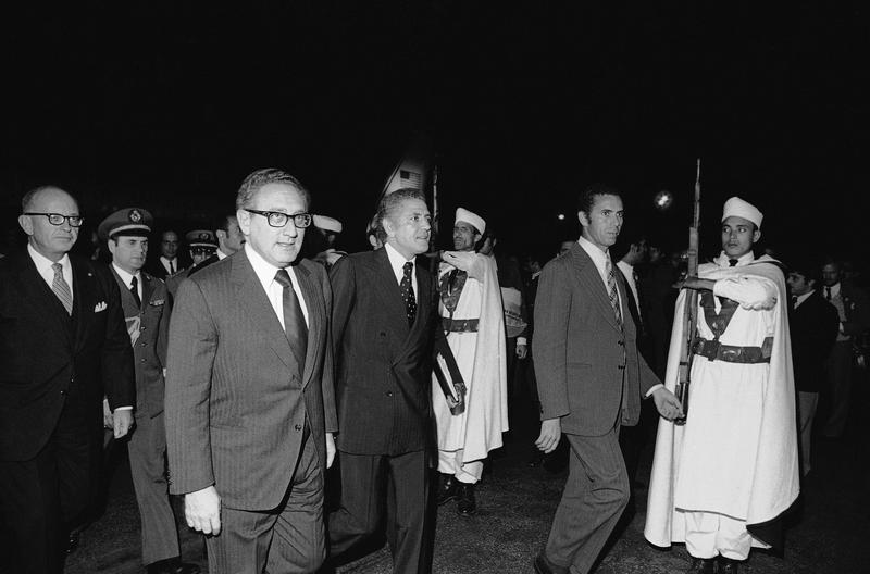 On his first stop on way to the Middle and Far East, U.S. Secretary of State Kissinger is welcomed by Moroccan foreign minister Ahmed Taibi Benhima on Nov. 5, 1973 in Rabat, Morocco.