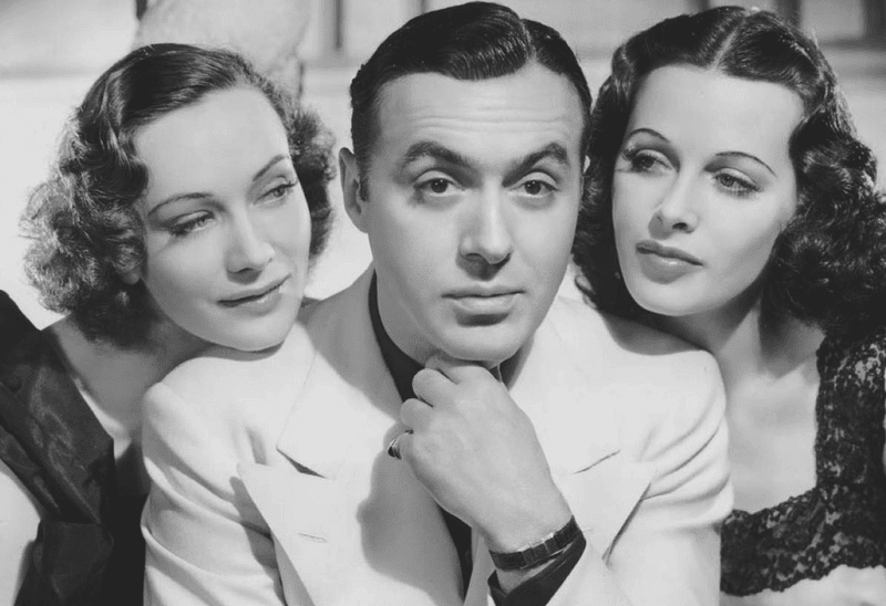 Charles Boyer with Sigrid Gurie (left) and Hedy Lamarr in Algiers (1938)