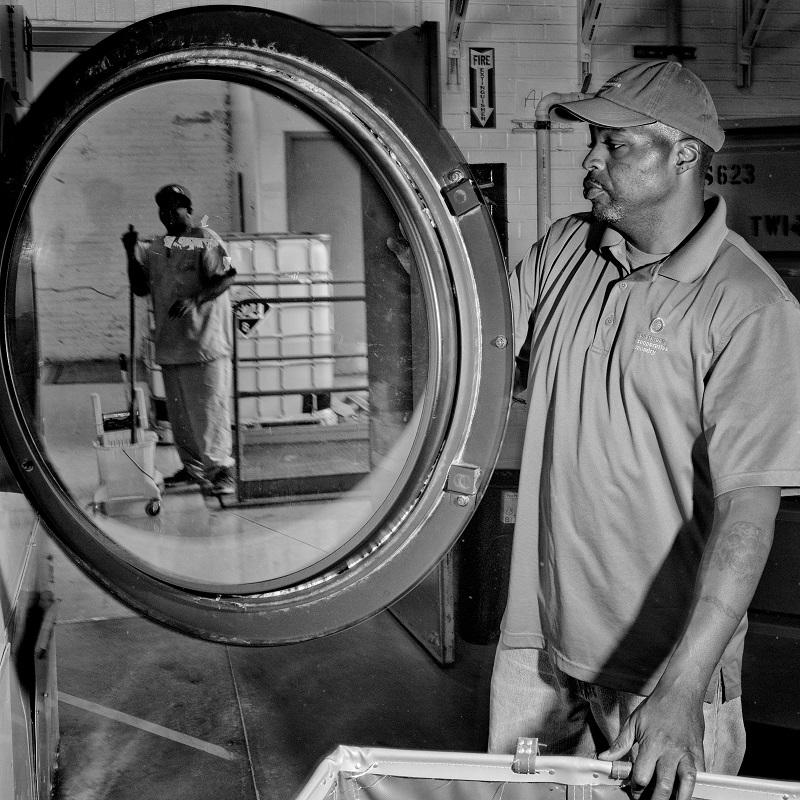 Chris Brown, a supervisor at the Evergreen Cooperative Laundry, a worker-owned company in Cleveland, Ohio.