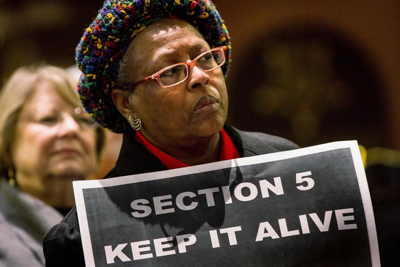 A supporter of the Voting Rights Act rallies in the South Carolina State House on February 26, 2013 in Columbia, South Carolina.